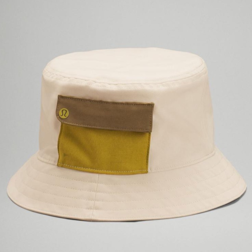 Lululemon On My Level Bucket Hat with pocket white opal/auric/gold/artifact